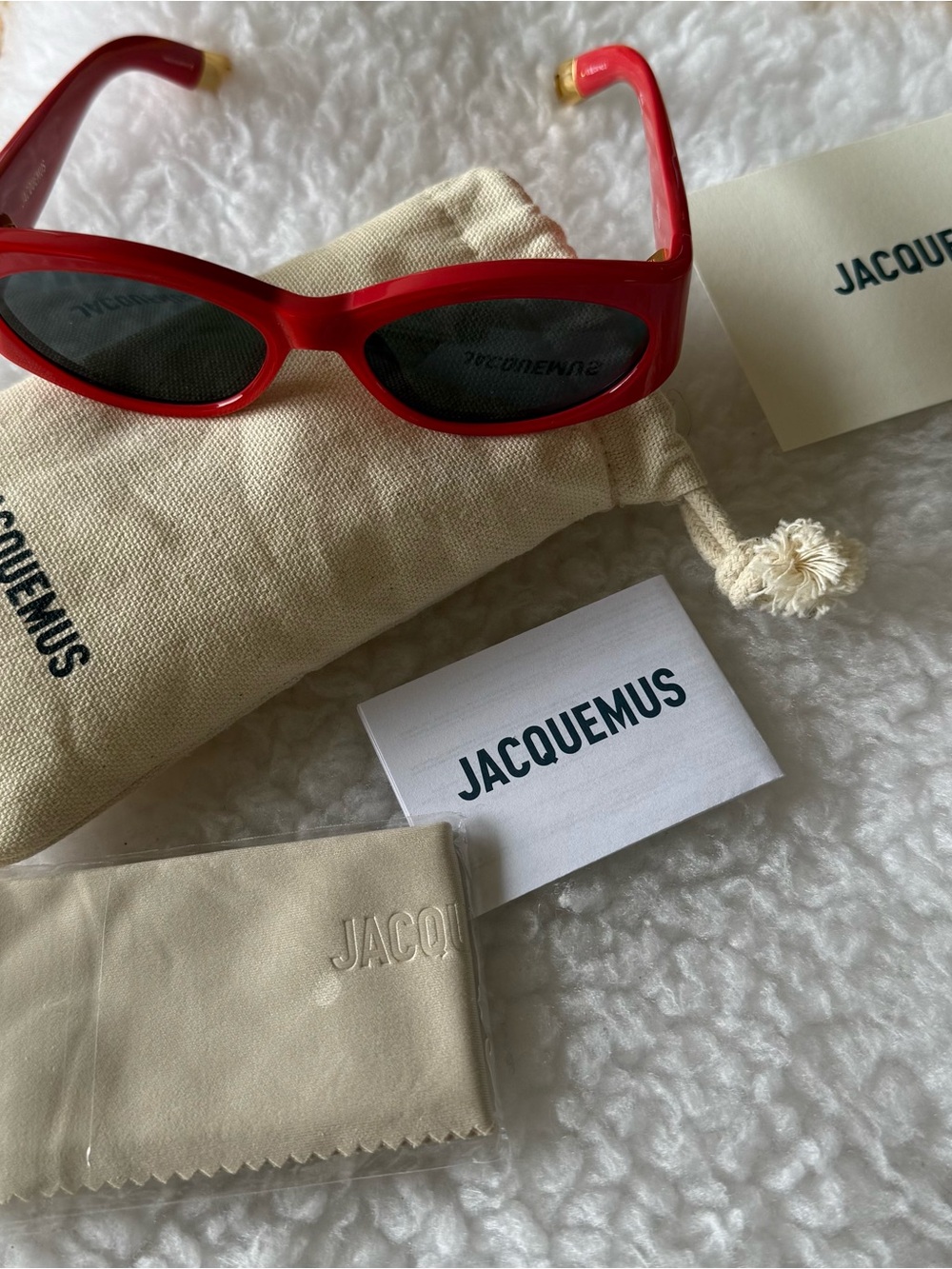 Jacquemus Bright Red Oval Sunglasses with Gold Accents